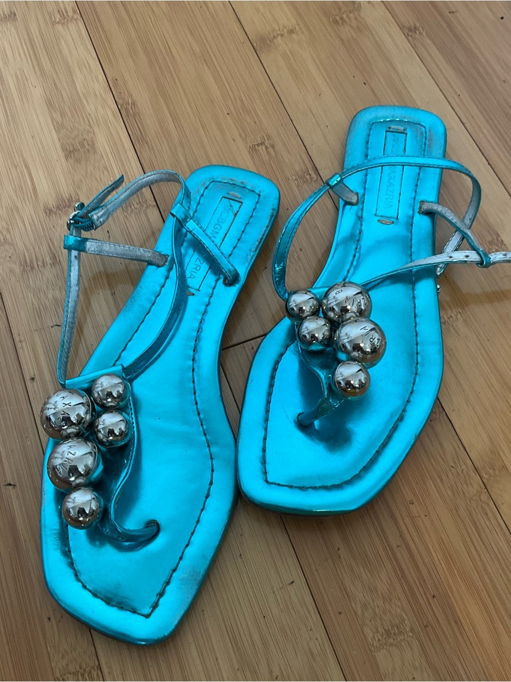 BCBGMaxAzria Metallic Turquoise Toe-Post Sandals with Silver Orb Accents